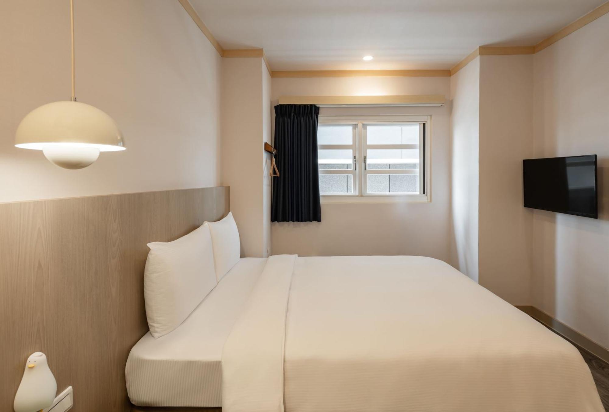 Kindness Hotel - Tainan Minsheng Номер фото