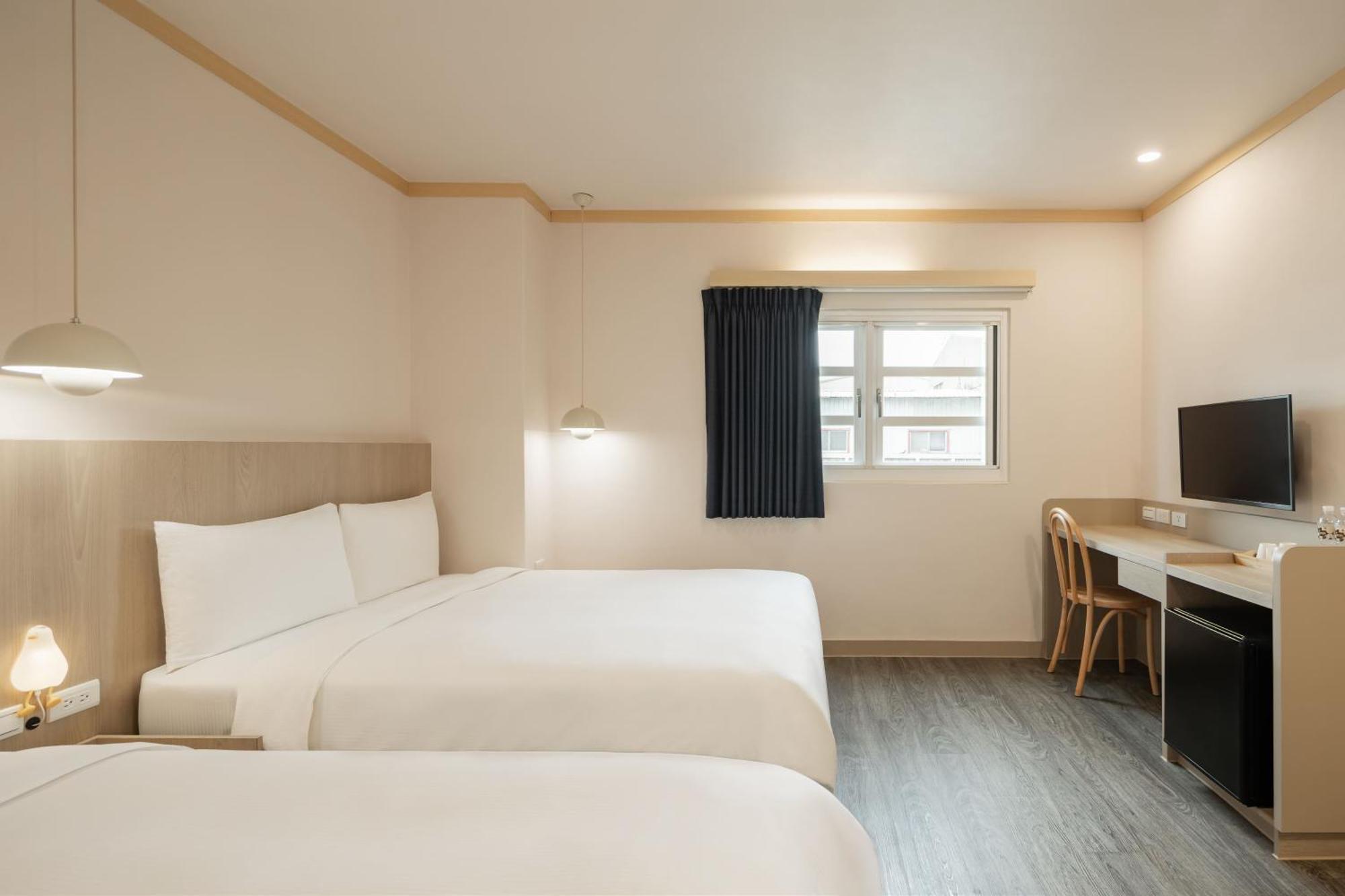 Kindness Hotel - Tainan Minsheng Номер фото