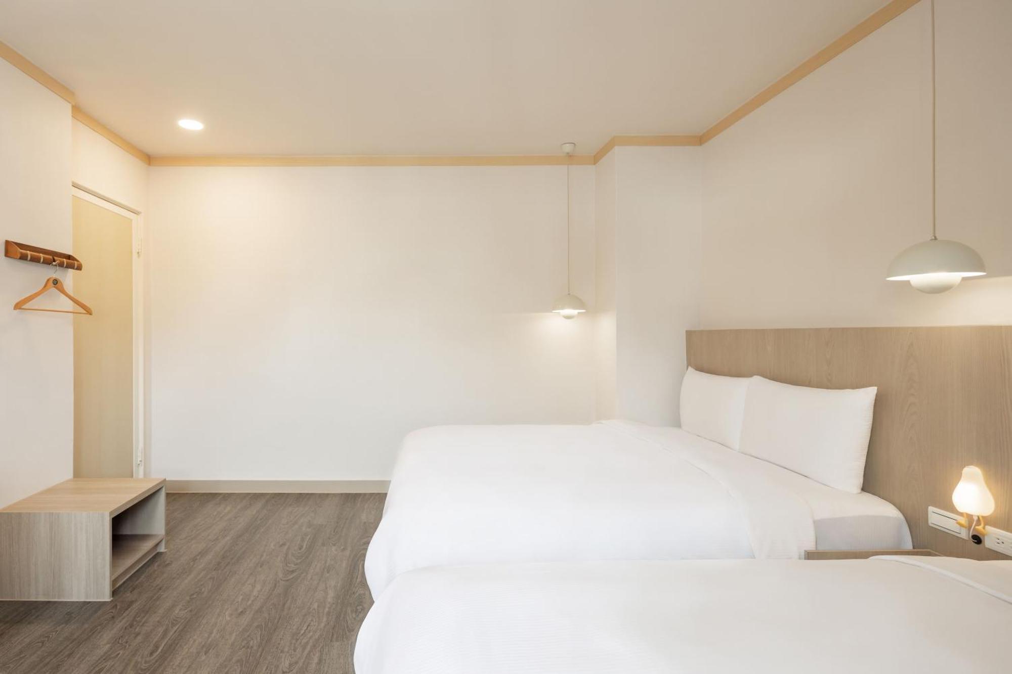 Kindness Hotel - Tainan Minsheng Номер фото