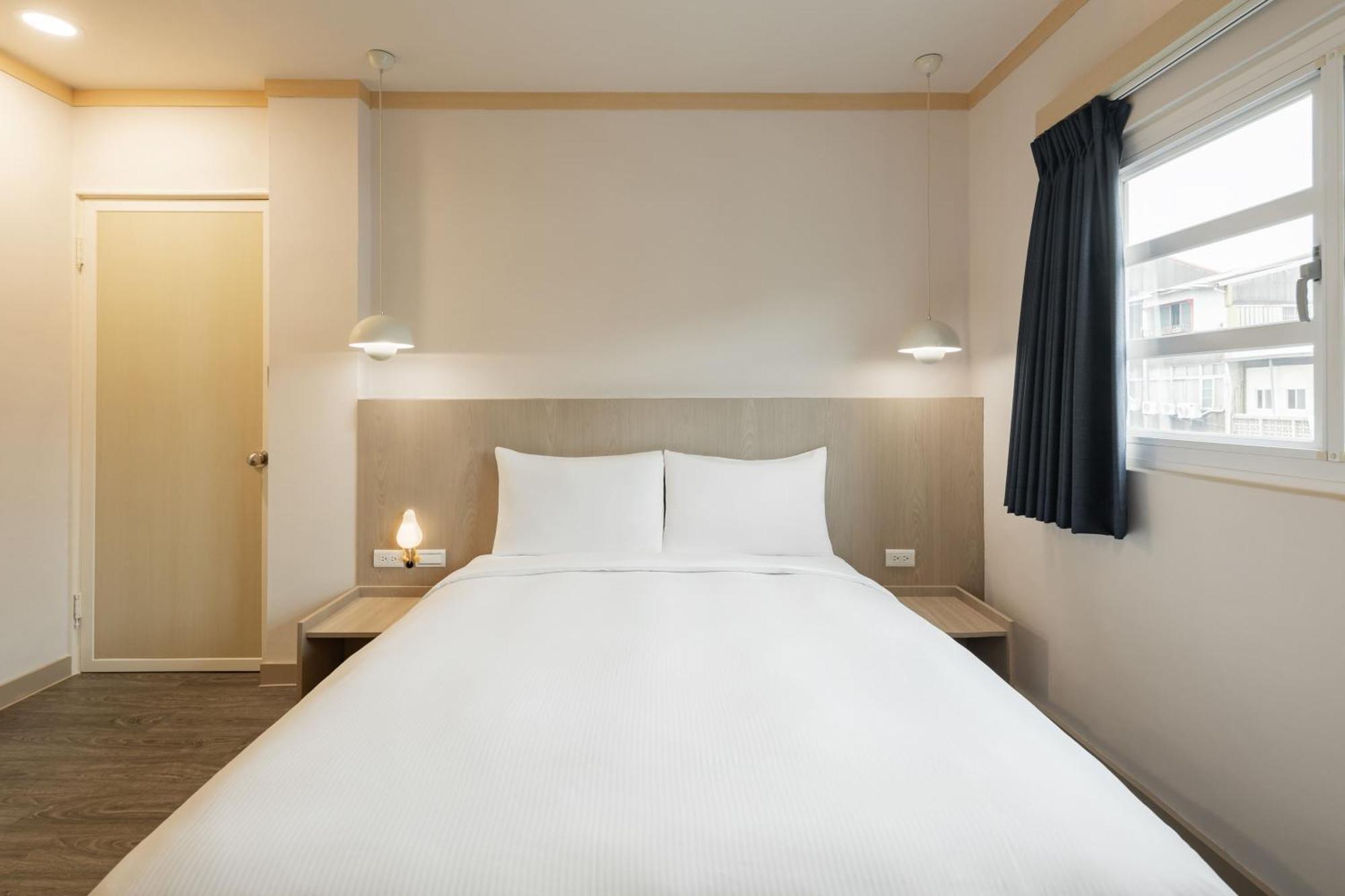 Kindness Hotel - Tainan Minsheng Номер фото