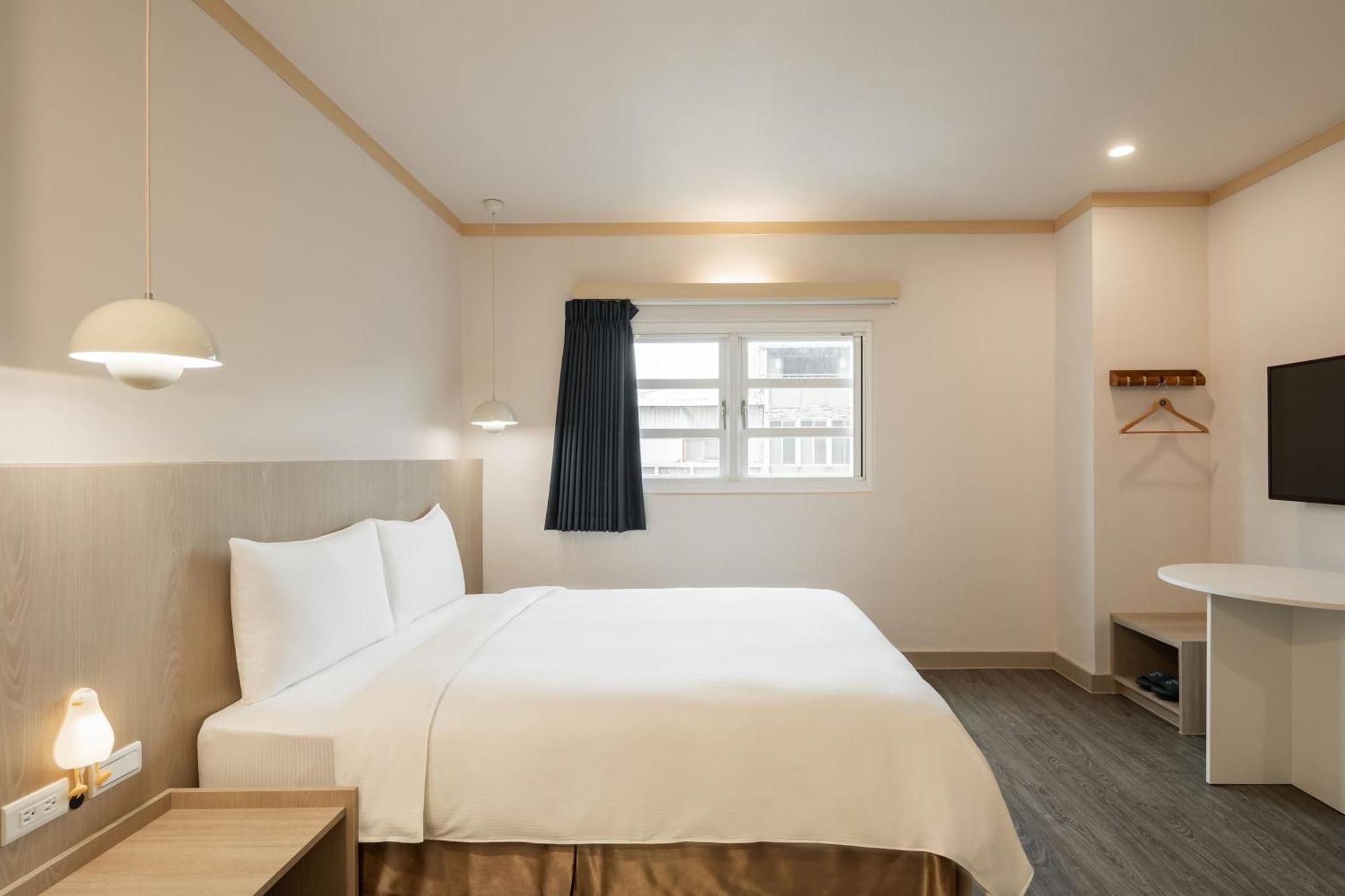 Kindness Hotel - Tainan Minsheng Номер фото