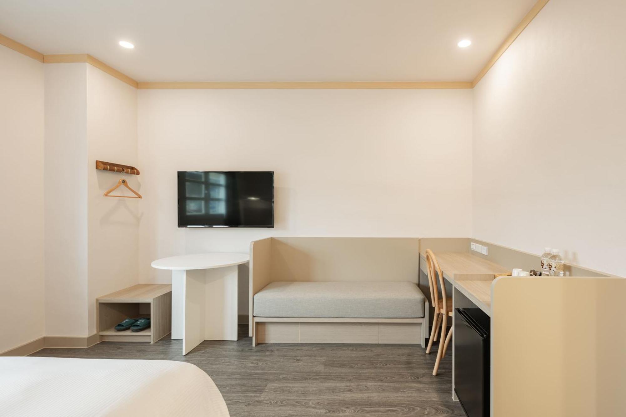 Kindness Hotel - Tainan Minsheng Номер фото