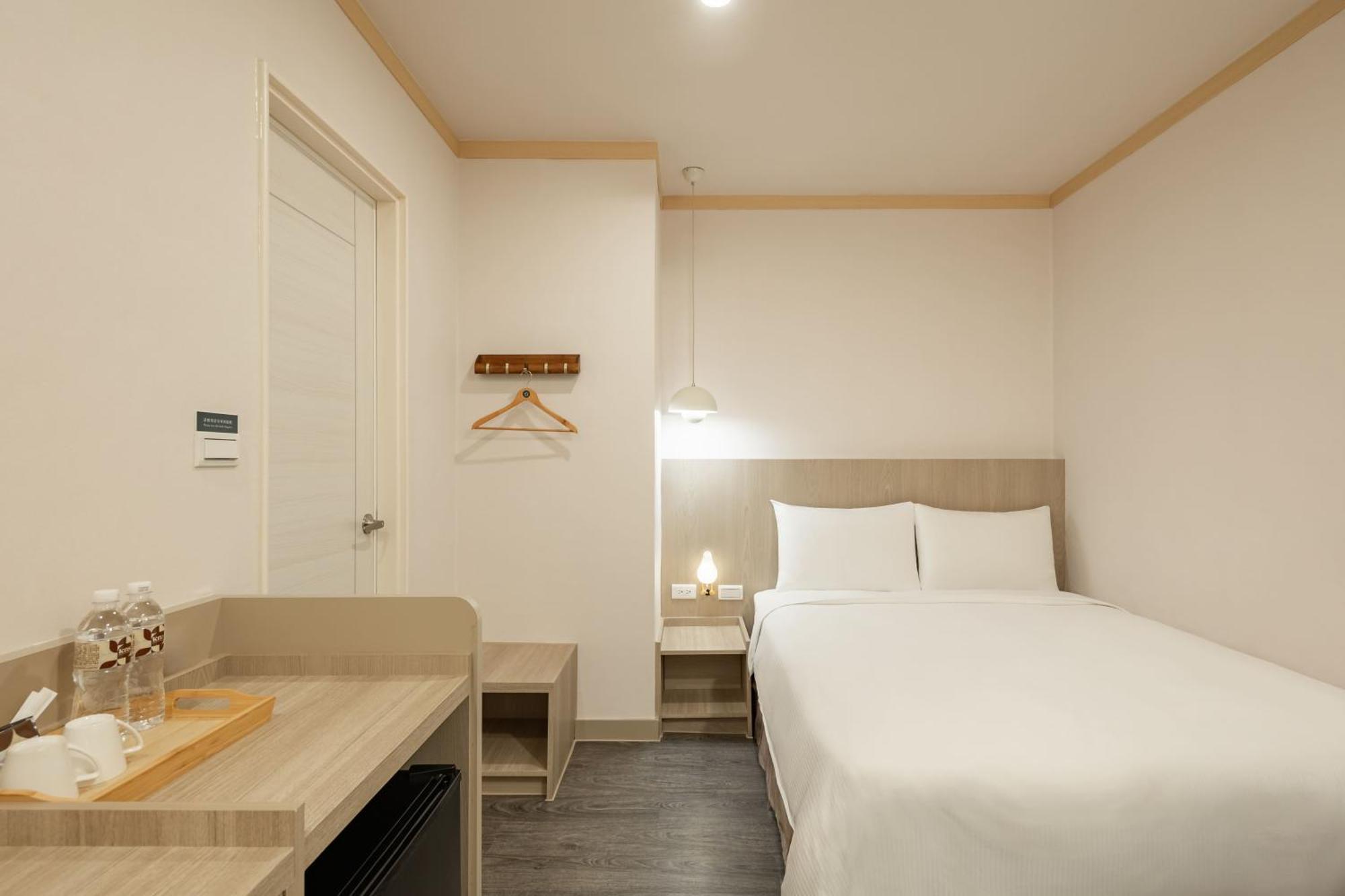 Kindness Hotel - Tainan Minsheng Номер фото